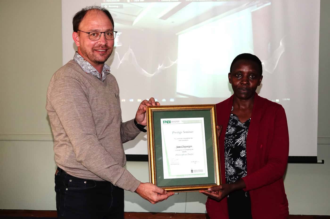 Jane Chepsergon celebrates the successful completion of her PhD