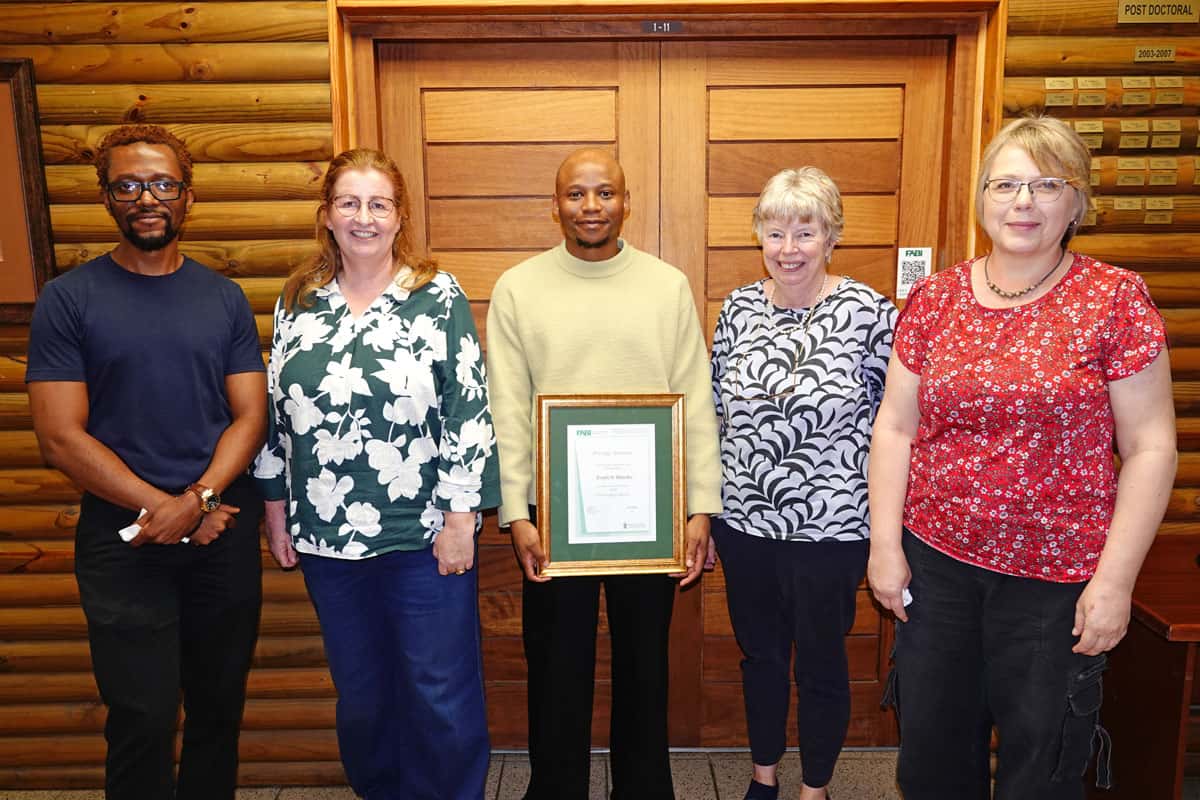 Sicelo Masuku with his PhD supervisors