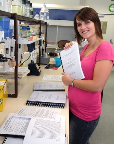 Two Masters students hand in their theses